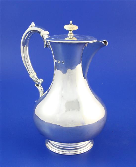 A George V silver hot water pot by William Hutton & Sons, gross 18.5 oz.